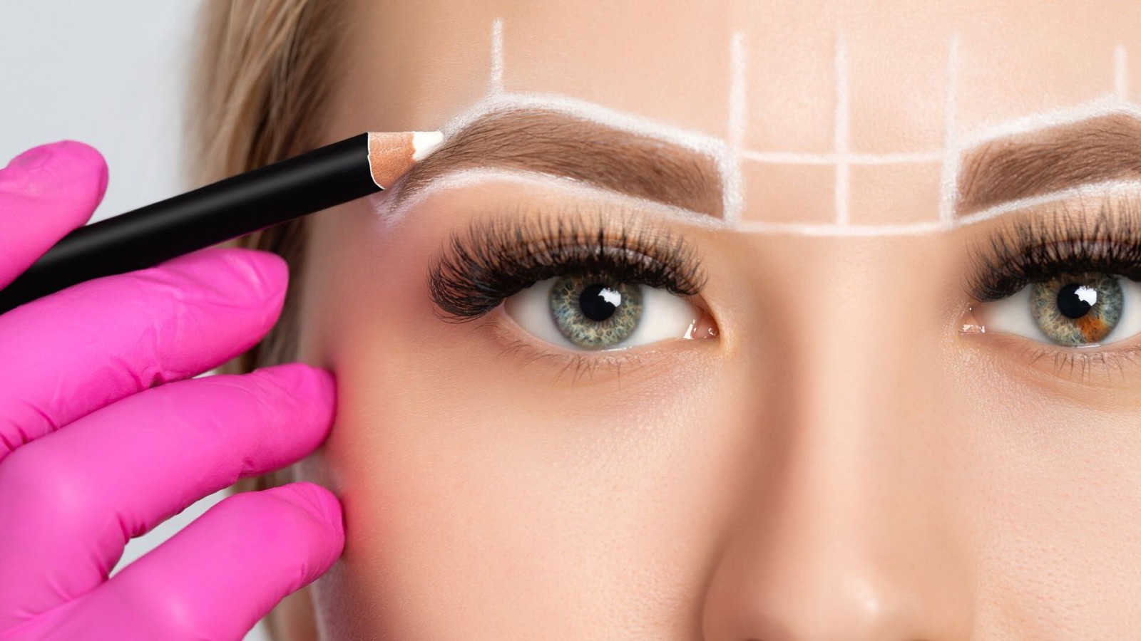 Detailed brow mapping and shaping in progress at Couture Brows & Aesthetics